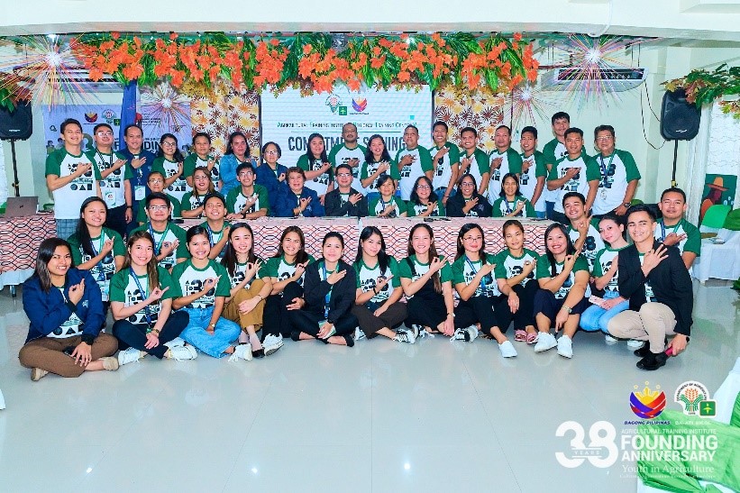 CTosoc_ATI Bicol staff showed a progress sign as they posed for a group photo during the Commitment Signing.jpg CTosoc_ATI Bicol staff showed a progress sign as they posed for a group photo during the Commitment Signing.jpg